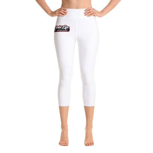 Image of model wearing New Bold Life Yoga Capri Leggings - Women's Apparel. The leggings are white with the Newboldlife logo on the right hip.