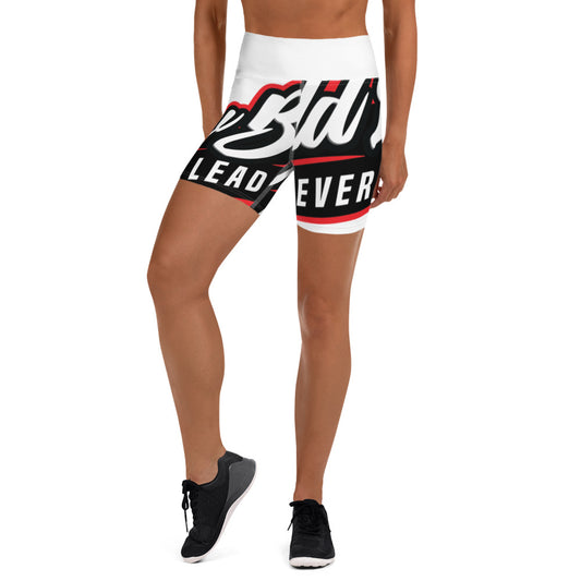 Image of model wearing New Bold Life Yoga Shorts - Women's Apparel. The shorts are white and wrapped all the way around from front to back with the Newboldlife logo 