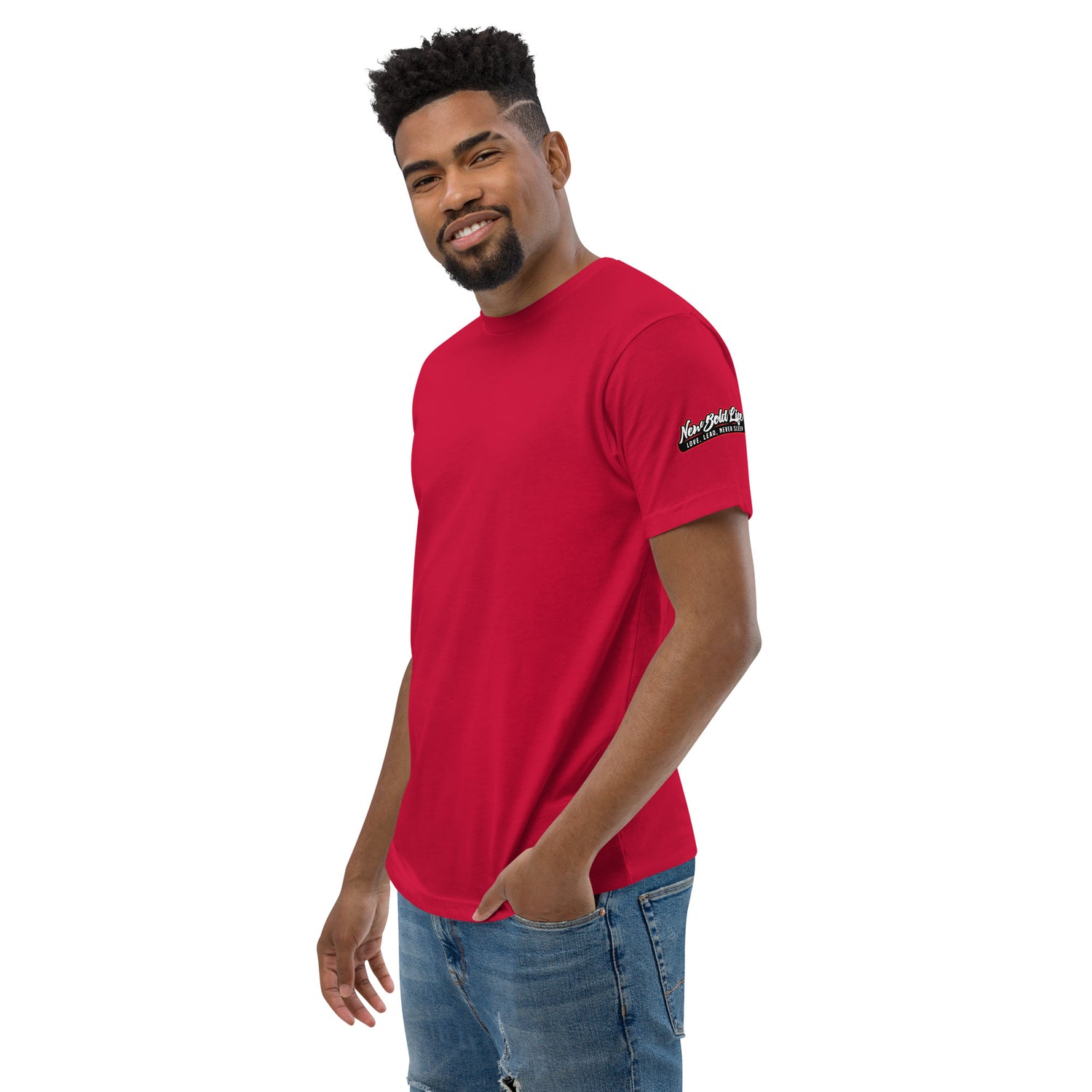 Model wearing a red New Bold Life Short Sleeve T-shirt - Men's Clothing. Newboldlife logo on left sleeve. 